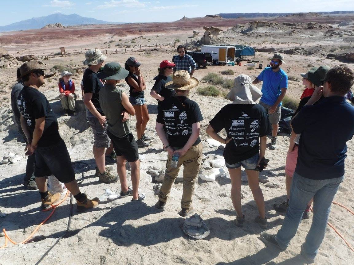 lecturing to visiting college students during excavations